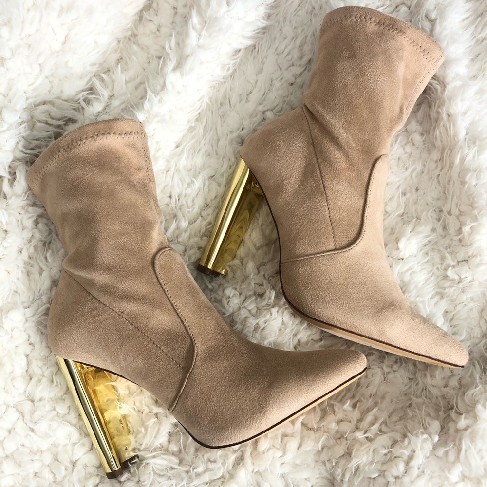 Nude pointed toe heeled booties